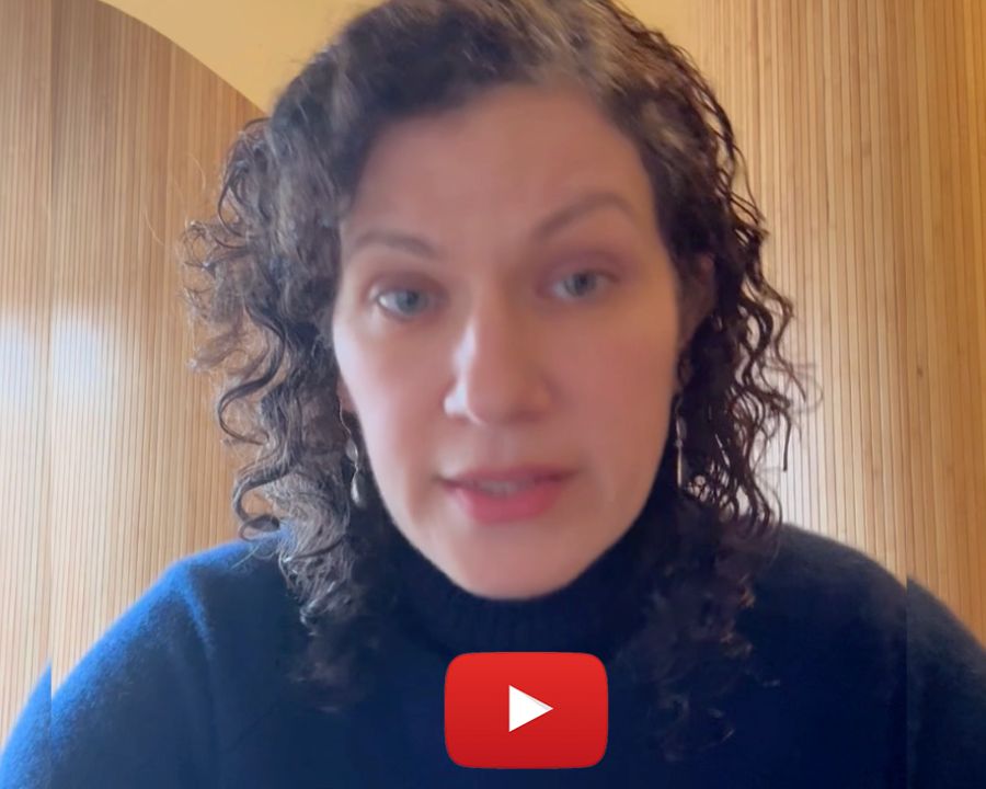 Image of Maria's face with play button