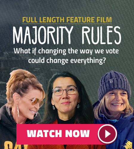 Mary Pelota smiling, people behind her, and a lot of political buttons in the background. Full length feature film. Majority Rules. What if changing the way we vote could change everything?